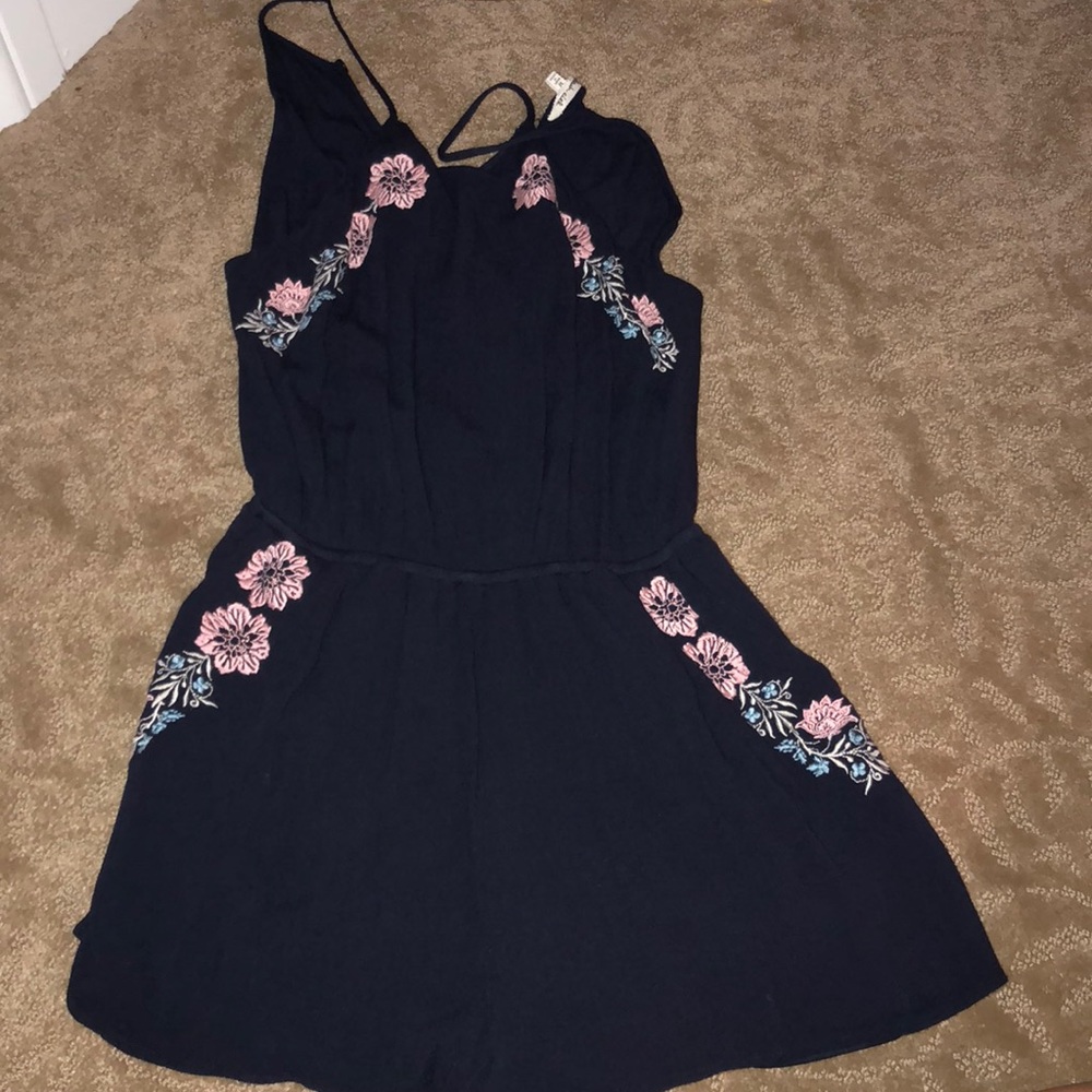 Dark blue romper with flowers